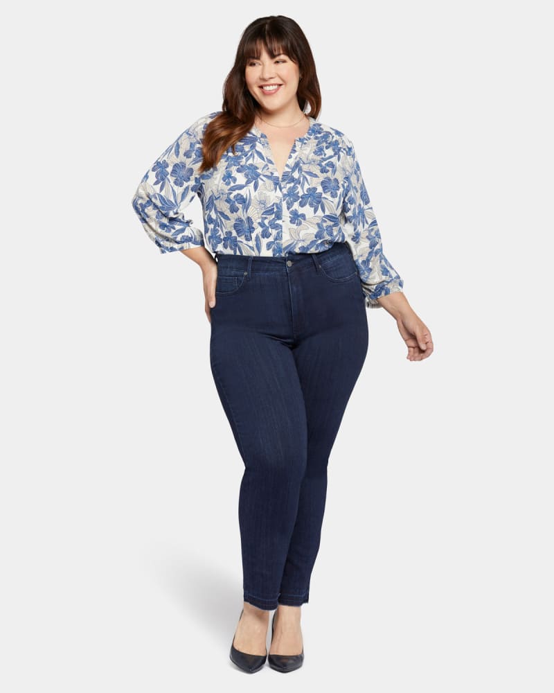 Front of a model wearing a size 14W The High Straight Released Hem in Highway by NYDJ. | dia_product_style_image_id:296193